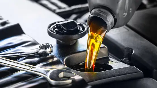 What happens if you put too much oil in your car?